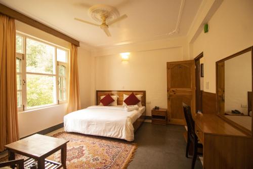 Кровать или кровати в номере WOW STAYZ2 Hotel The Lodge