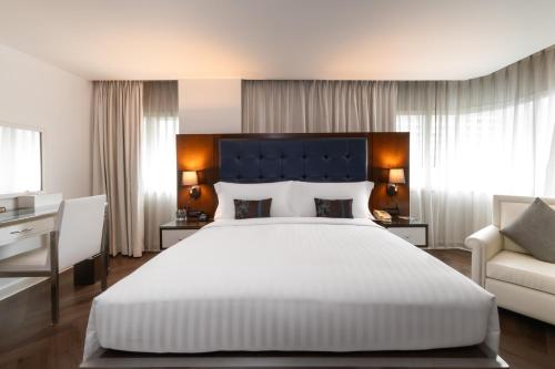 Letto o letti in una camera di Night Hotel Bangkok - Sukhumvit 15