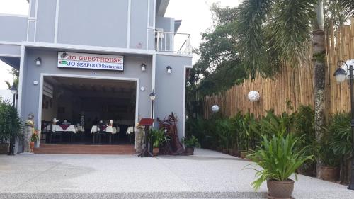 a restaurant with a no dining sign in a building at MJ Boutique Hotel Khao Lak in Khao Lak