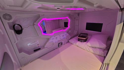 Postel nebo postele na pokoji v ubytování Hotel Galaxy Pod