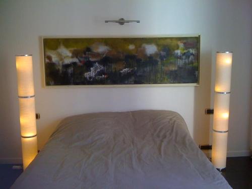 Ένα ή περισσότερα κρεβάτια σε δωμάτιο στο Loft New Yorkais in Paris Bercy