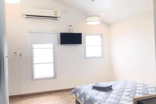 Cama ou camas em um quarto em Urban Bed