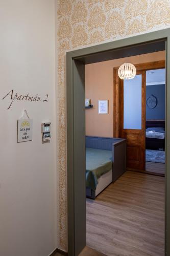 Ein Bett oder Betten in einem Zimmer der Unterkunft Penzion Lederer