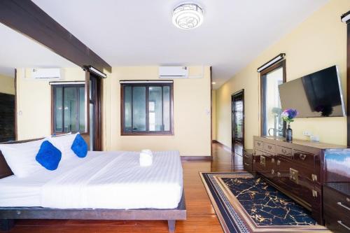 Katil atau katil-katil dalam bilik di Welcome Sea View Pool Villa