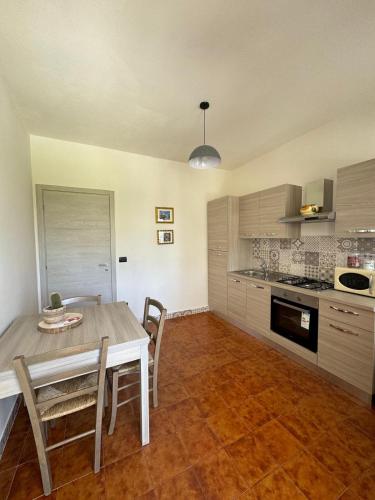 Kuchyň nebo kuchyňský kout v ubytování B&B Il Giardinetto