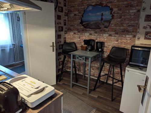 Kuchyň nebo kuchyňský kout v ubytování Ferienwohnung Apartment Wilhelmshaven Inselviertel in bester Lage - selbständiger Check in möglich