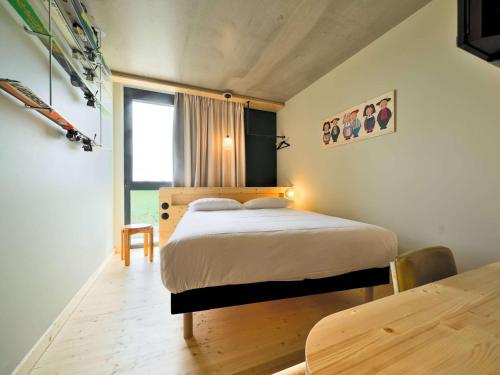 Katil atau katil-katil dalam bilik di greet hotel Cernay Mulhouse