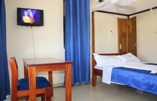 Postel nebo postele na pokoji v ubytování BMA Accommodation Centre
