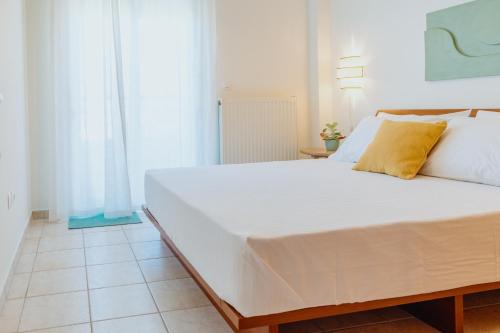 Ένα ή περισσότερα κρεβάτια σε δωμάτιο στο The Green - Svolio Hospitality