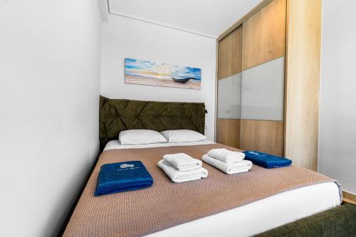 Ένα ή περισσότερα κρεβάτια σε δωμάτιο στο Vento Villas