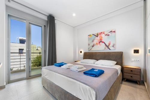 Ένα ή περισσότερα κρεβάτια σε δωμάτιο στο Vento Villas