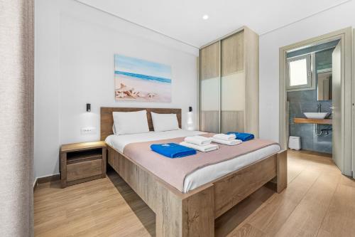 Ένα ή περισσότερα κρεβάτια σε δωμάτιο στο Vento Villas