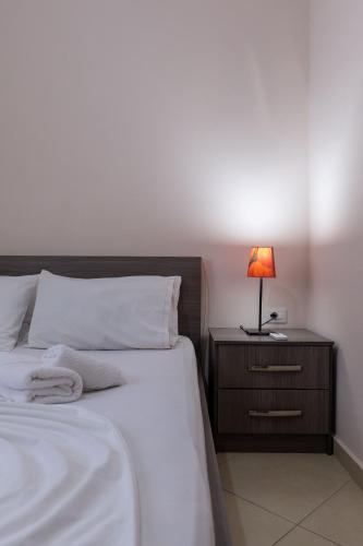 Ένα ή περισσότερα κρεβάτια σε δωμάτιο στο Erioni Hotel