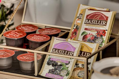 a display of some food in a display case at ARI Central Grand Apartments - Luxurious Stay in Arad