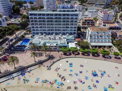 an aerial view of a beach in front of a hotel at Seramar Hotel Comodoro Playa in Palmanova