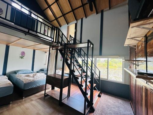 Postel nebo postele na pokoji v ubytování บ้าน Ba you