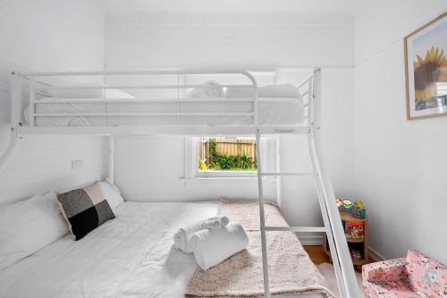Ένα ή περισσότερα κρεβάτια σε δωμάτιο στο Mibnb York St Geelong