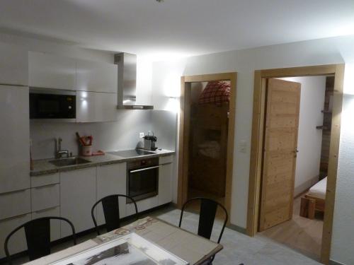 Kuchyň nebo kuchyňský kout v ubytování Apartment Chalet Mont Noble, 4 Vallées