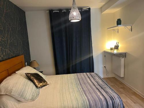 Ένα ή περισσότερα κρεβάτια σε δωμάτιο στο Maison neuve Limoges sud