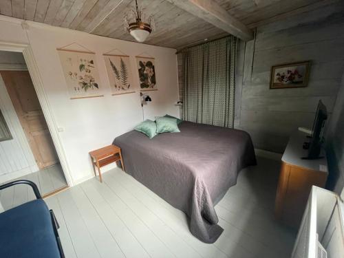 Postel nebo postele na pokoji v ubytování Pensionat Gyllenhjelmsgatan