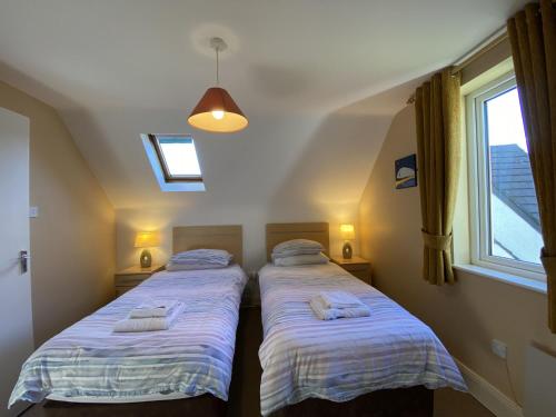 Postel nebo postele na pokoji v ubytování Cottage 470 - Clifden