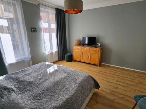 Postel nebo postele na pokoji v ubytování Ferienwohnung am Stadthafen