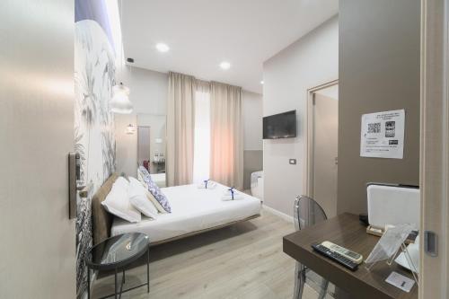 Ένα ή περισσότερα κρεβάτια σε δωμάτιο στο B&B Les Lumières