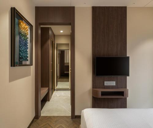 Μια τηλεόραση ή/και κέντρο ψυχαγωγίας στο Orbit Serviced Apartments