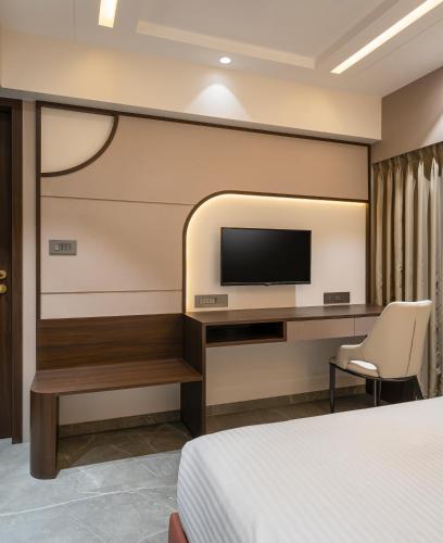 Μια τηλεόραση ή/και κέντρο ψυχαγωγίας στο Orbit Serviced Apartments