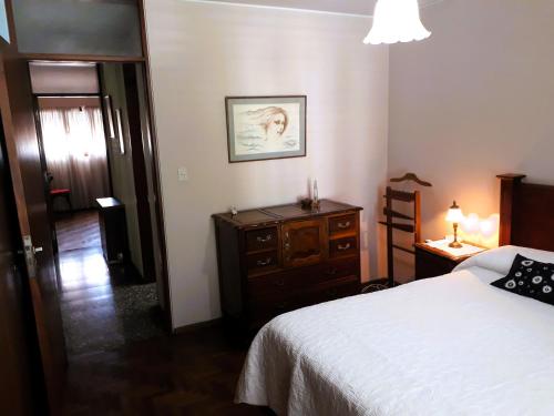 Ένα ή περισσότερα κρεβάτια σε δωμάτιο στο Casa familiar céntrica