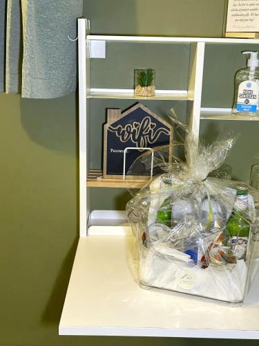 a refrigerator with a bag of food on a shelf at The Rosemary Stay in Hull