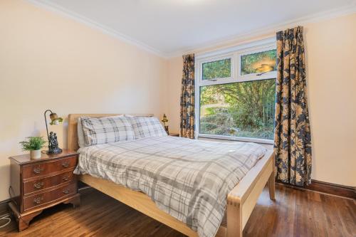 Katil atau katil-katil dalam bilik di Bayview House Silverdale