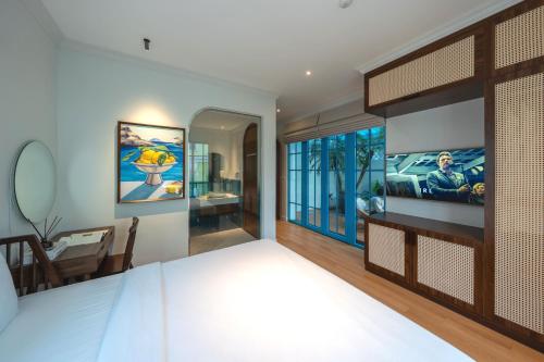 Ένα ή περισσότερα κρεβάτια σε δωμάτιο στο domdomHOUSE Villa - 1min walk to beach