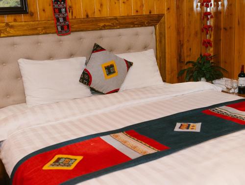 Postel nebo postele na pokoji v ubytování H'Mong Cát Cát Homestay