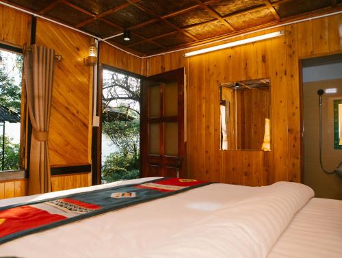 Postel nebo postele na pokoji v ubytování H'Mong Cát Cát Homestay