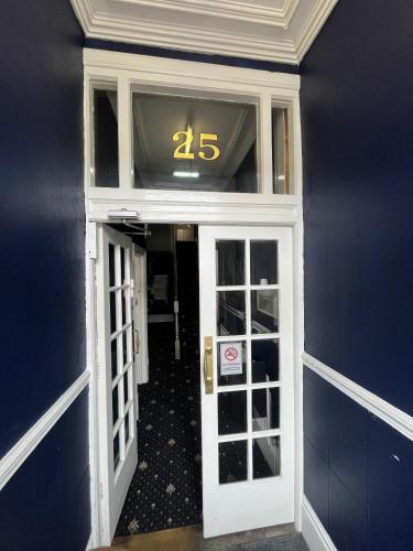 a front door of a building with the number at Stay at 25 in Blackpool