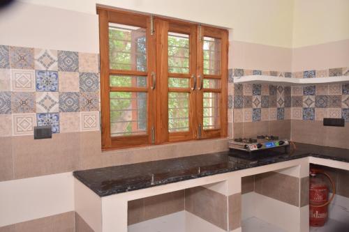 Kuchyň nebo kuchyňský kout v ubytování Blue Bell Homestay