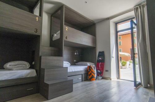 Postel nebo postele na pokoji v ubytování Antica Campione Rooms & Hostel