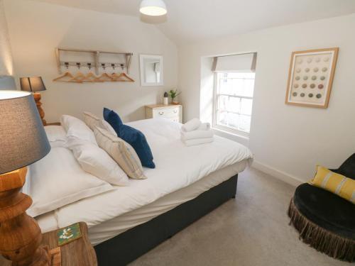 Postel nebo postele na pokoji v ubytování Apple Tree Cottage