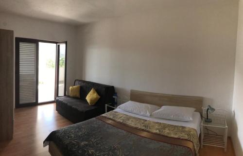 Posteľ alebo postele v izbe v ubytovaní Apartments Deni