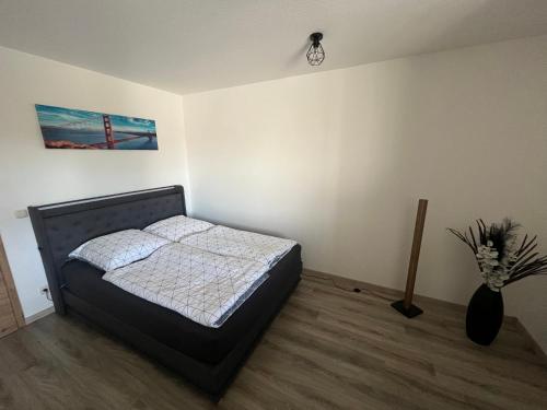 Postel nebo postele na pokoji v ubytování Ferienwohnung Bad Sulza