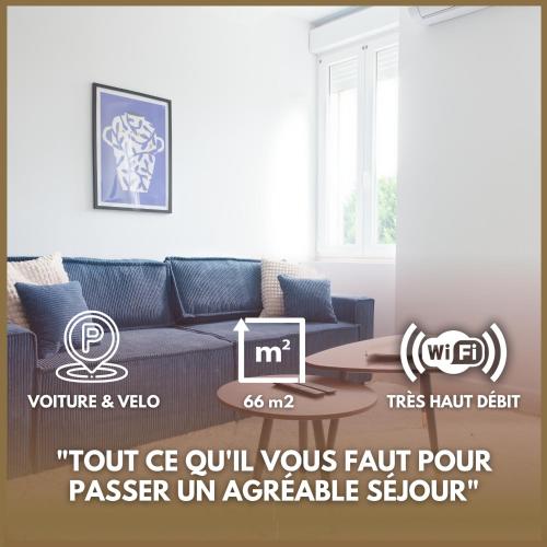 a living room with a couch and a table at Appartement de l'UNESCO de Blaye- Spacieux & confort - 2 chambres in Blaye