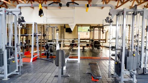 a gym with a lot of equipment in it at Bogota Plaza Hotel in Bogotá