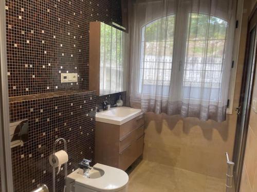 Koupelna v ubytování Villa las palmeras