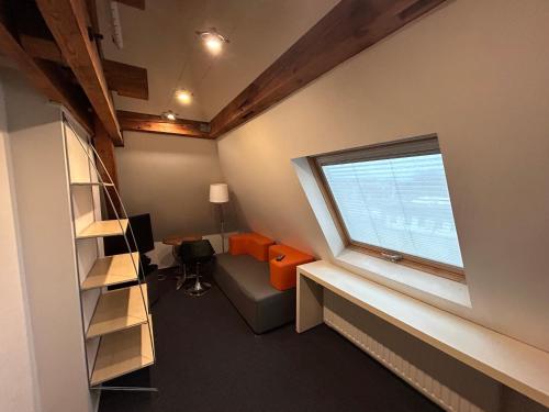 Ένα ή περισσότερα κρεβάτια σε δωμάτιο στο Chambres chez Jean Luc