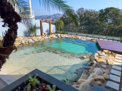 Bazén v ubytování Lake's House - Piscina natural aquecida nebo v jeho okolí