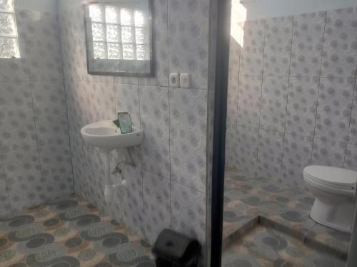 A bathroom at NURBATA HOLDING'S Hostel