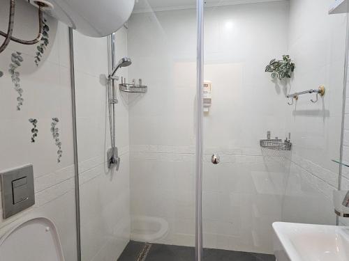 Koupelna v ubytování Bright Inn - Holiday & Business Apartment