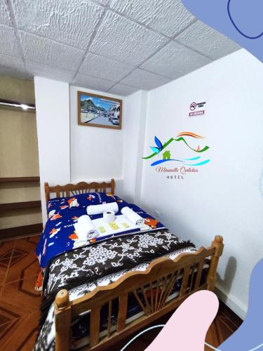 a bedroom with a bed in a room at Miravalle Quilotoa Hotel in Zumbahua