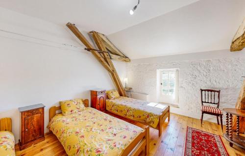 Postel nebo postele na pokoji v ubytování Presbytère De Pompiac